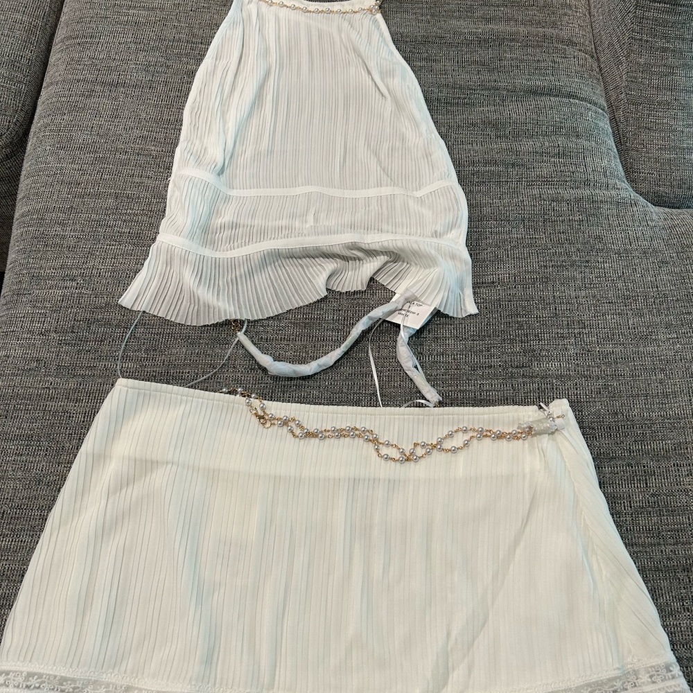 Two piece top & skirt from Sasha & Therese. Tags on and never worn